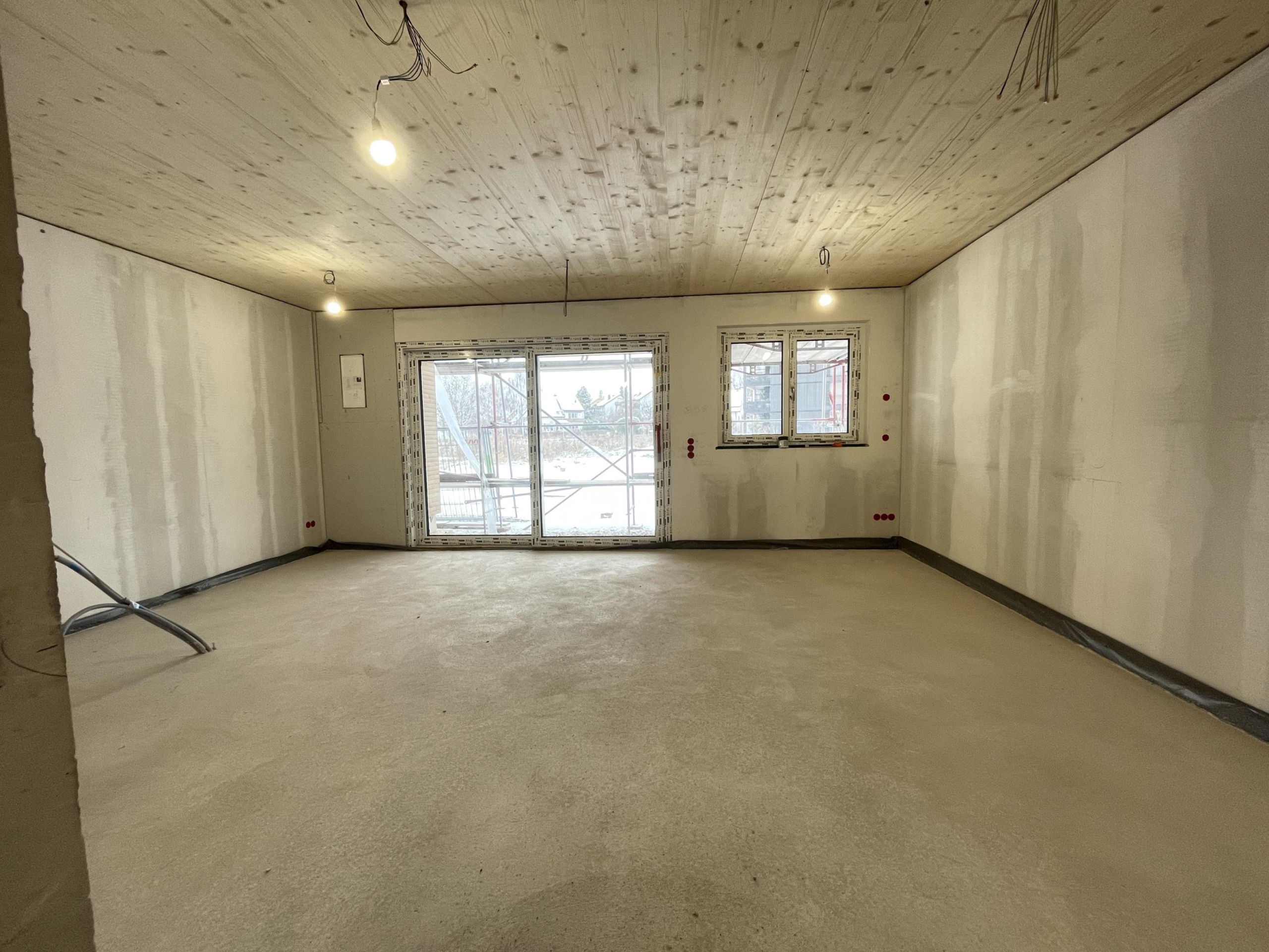 Wohn- und Esszimmer mit offener Küche