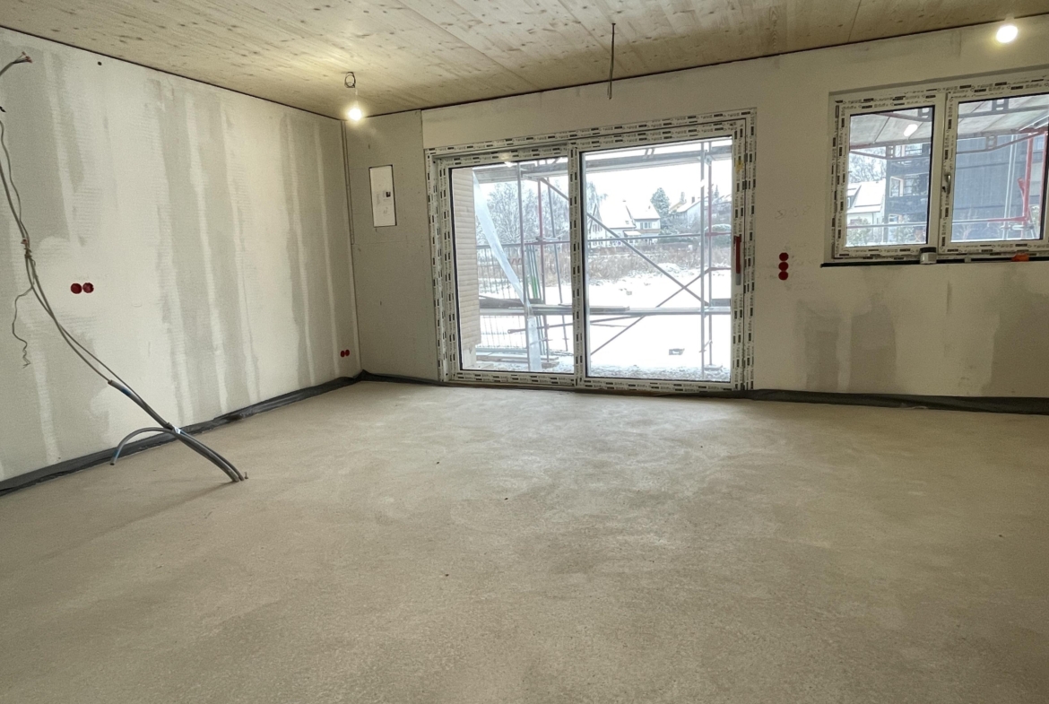 Wohn- und Esszimmer mit ofener Küche